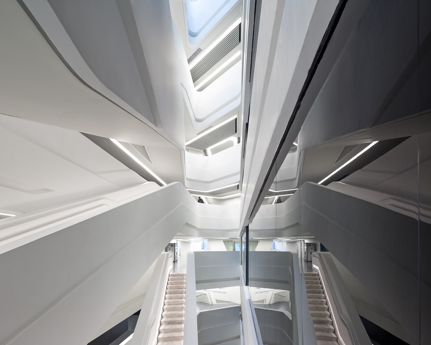 Symmetrical Atrium reflection at the innovation_tower_by_zaha_hadid_architects-56.jpg